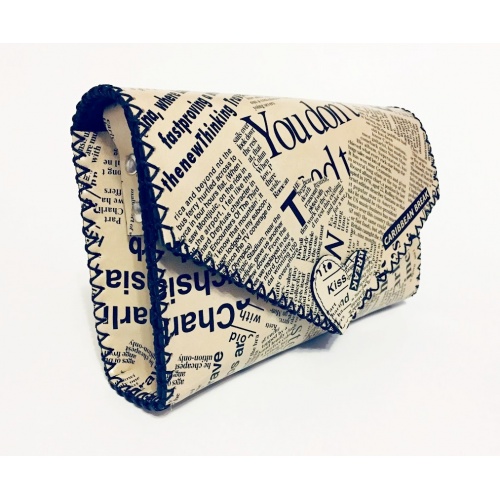 https://www.carmenittta.ro/uploads/products/2020W43/newspaper-print-leather-handmade-bag-0084-gallery-1-500x500.jpg