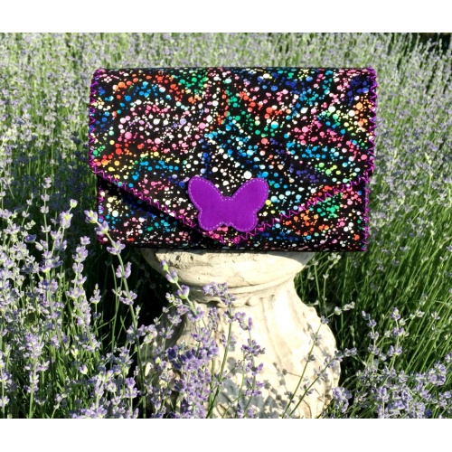 https://www.carmenittta.ro/uploads/products/2022W24/black-suede-leather-with-confetti-print-with-a-purple-camoscio-leather-butterfly-handmade-bag-0205-gallery-1-500x500.jpg