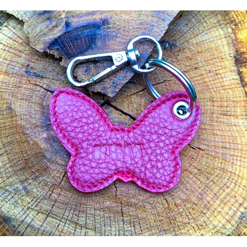 https://www.carmenittta.ro/uploads/products/2023W01/magenta-leather-butterfly-keychain-krm-0223-gallery-1-500x500.jpg