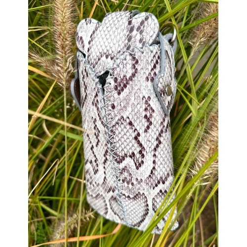 https://www.carmenittta.ro/uploads/products/2023W49/gray-white-and-black-snakeprinted-leather-handsewn-phonecase-0262-gallery-1-500x500.jpg